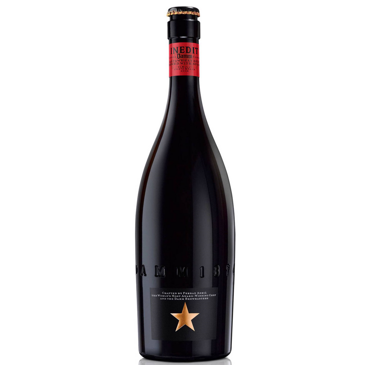 A bottle of Inedit Estrella Damm beer with a dark label and a red star logo.