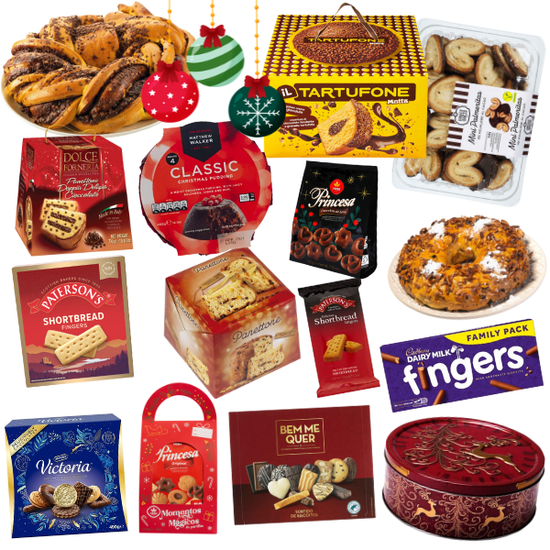 Collection of Christmas-themed cookies and biscuits with a Christmas tree and presents in the background.